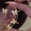 SHEIN 1pc Elegant Fashion Gold Butterfly Rhinestone Ear Cuff