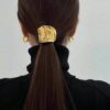 SHEIN 1pc Metallic Hollow Out Hairpin Ponytail Holder