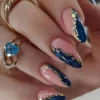 SHEIN short almond nails with white pattern, silver glitter