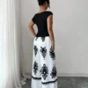 SHEIN Islaluna 2 Pieces Set: Women Solid Asymmetrical Hem T-Shirt And Floral Print Wide Leg Pants
